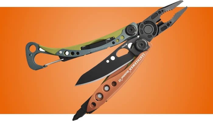 Leatherman Skeletool CX multi-tool opened, with its pocket clip and carabiner