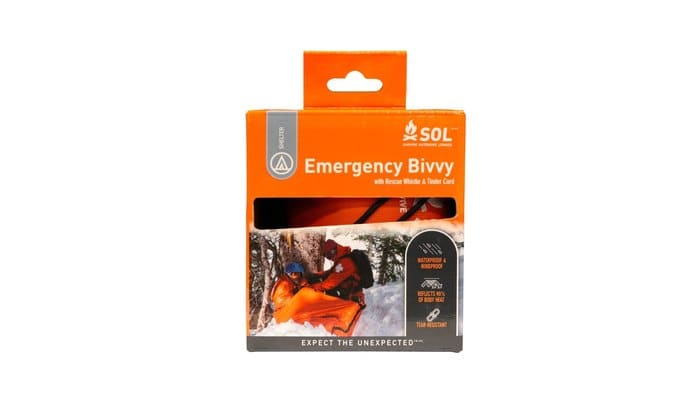 SOL Emergency Bivvy with rescue whistle in its orange retail box